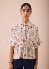 A Model Wearing White Handwoven Cotton Rustic Beginnings Handspun Handwoven Organic Cotton Peplum Top, curated by Only Ethikal